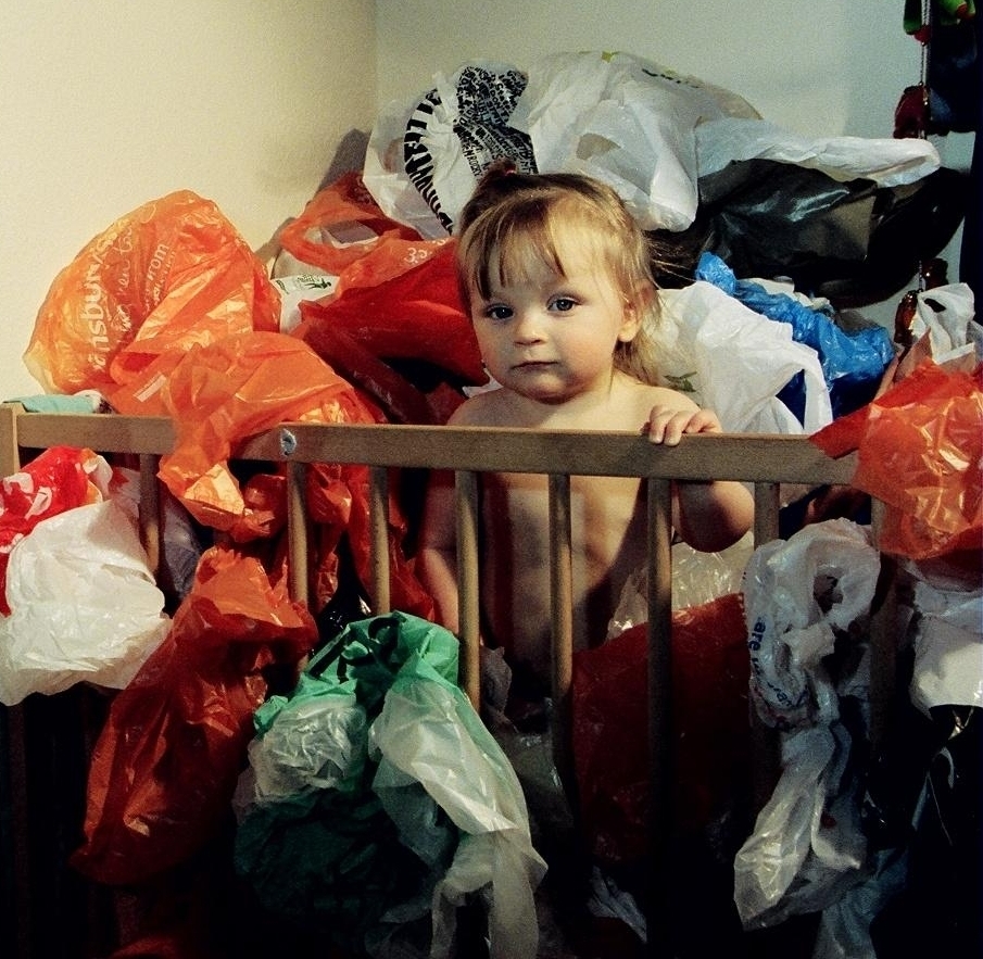 baby with bags