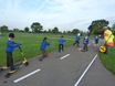 Buckingham pupils scooting on the play road