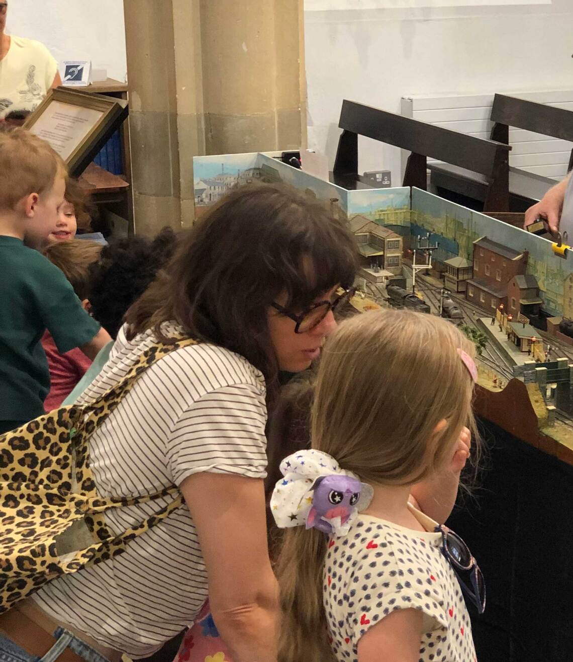 Members of the public watch the running