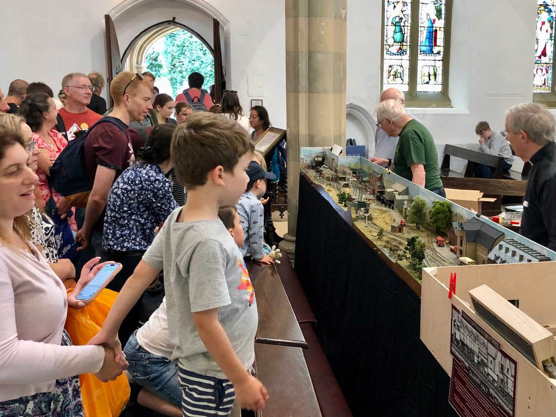 Wide shot of public around the layout