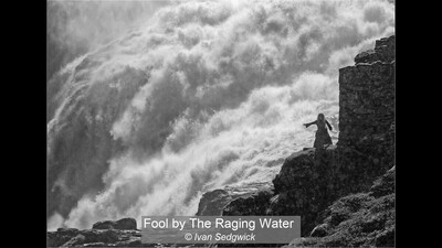 Fool by raging water
