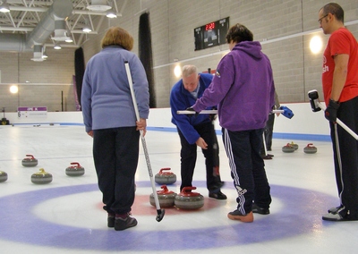 Derek checks the result of his shot