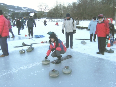 Janice Young prepares to deliver stone