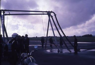 Twin 6" supply hose over a supply bridge