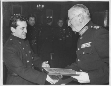 Bucks Lord Lieutenant presenting a commendation certificate to Marlow Fireman