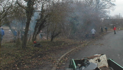 Villagers clear the hedges
