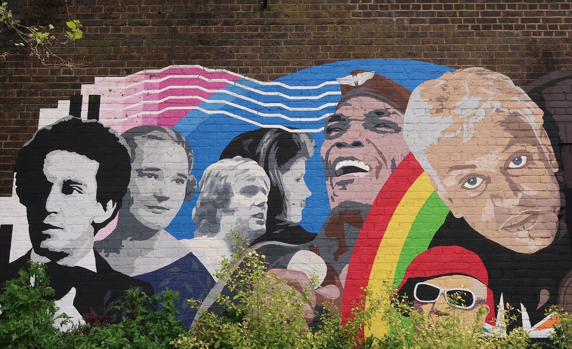 A painted mural showing people from Croydon's music heritage