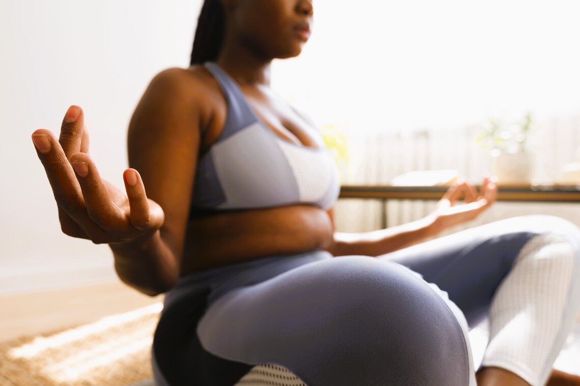 Woman gentle yoga pose meditating 