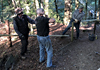 Volunteers mending a fence