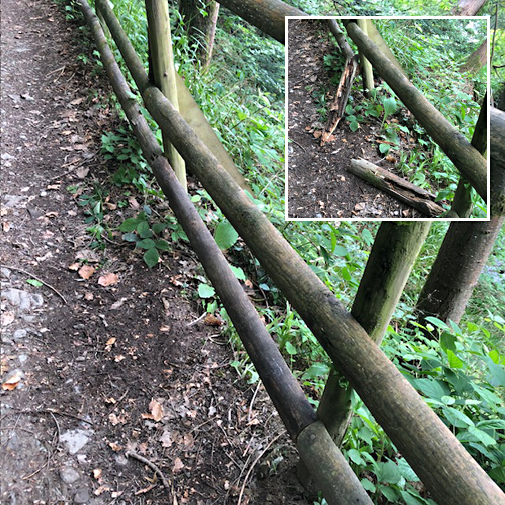 Broken fence rail repaired using reused timber.