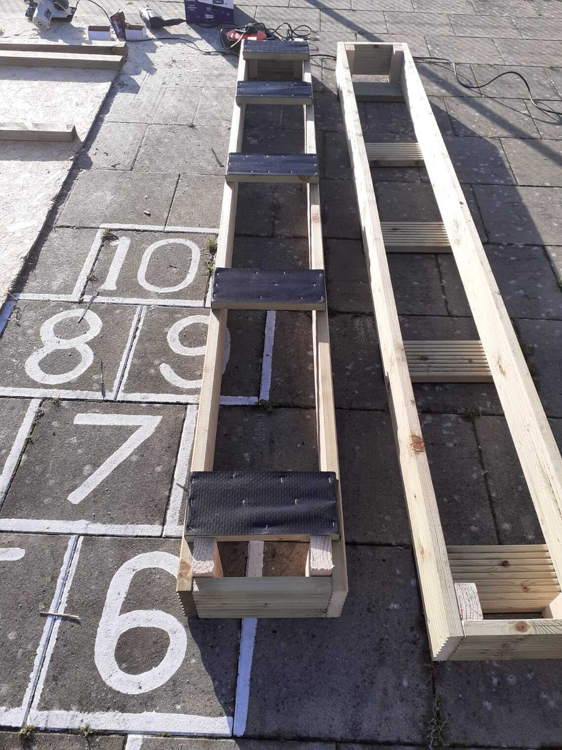 flower beds along fence line