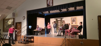 Anne as Gerry (the director of the play inside the play)