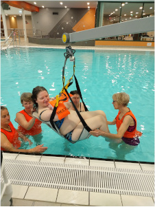 Photo of Member being hoisted out