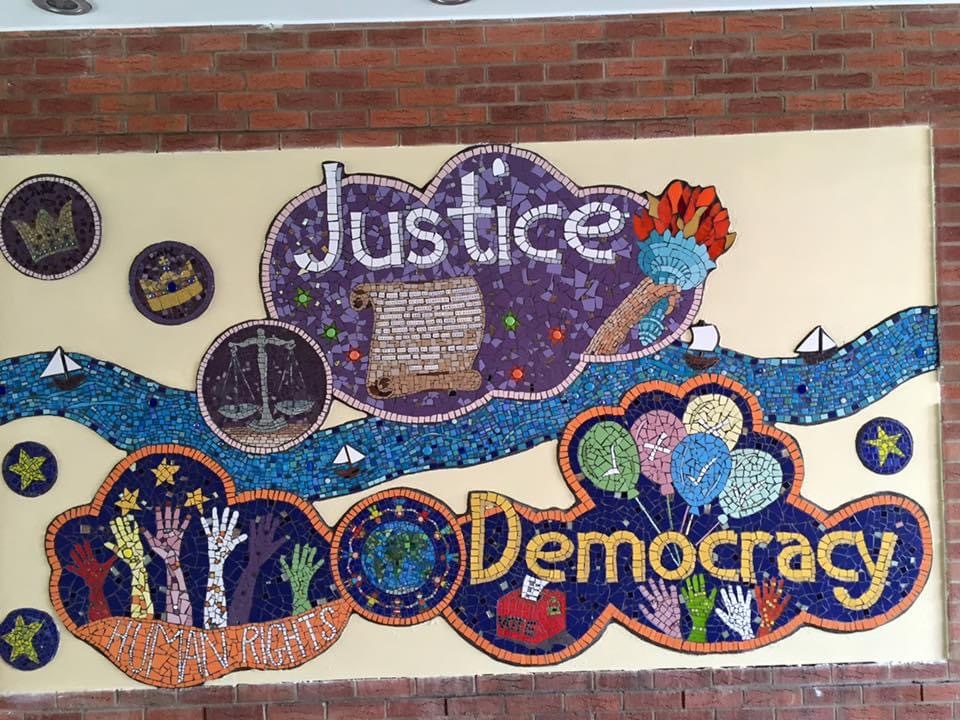 The mural is in the tunnel leading from the High Street to Waitrose