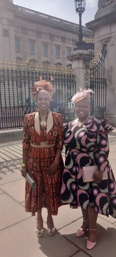 sharon-johanna outside gate of B.P