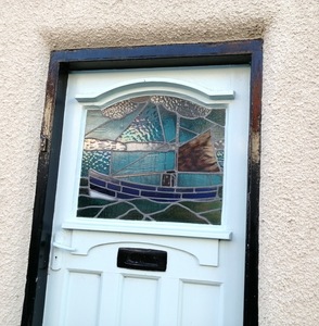 Queen Street showing Staine Glass front door
