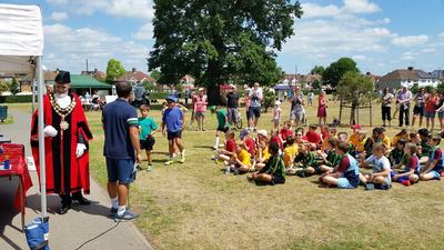 The Mayor giving out medals for the tag rugby tournament