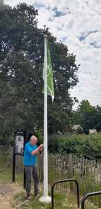 David raising the flag