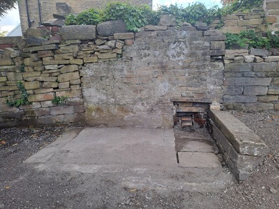 Whilst clearing the corner in Section 3 we 'dug out' the original stone flooring of what may have been the old toilet block or store shed 