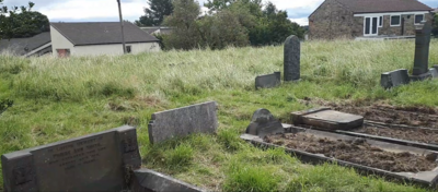 Graves being uncovered August 2020
