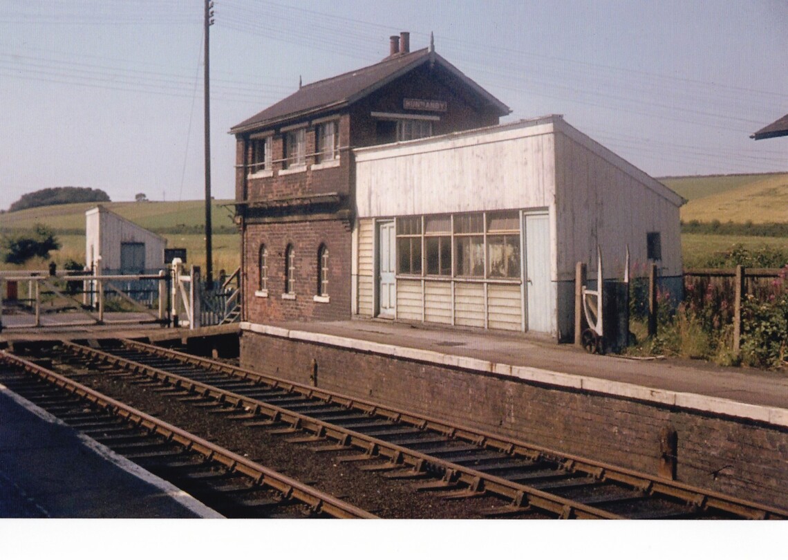 1969.8.7 Timber waiting room on down platform, signal box to left