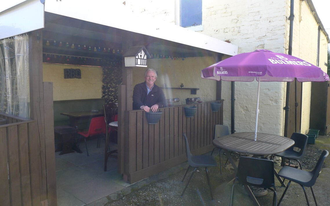 Landlord Dave, at the Horseshoe, Hunmanby new covered 'smokers corner' April 2021