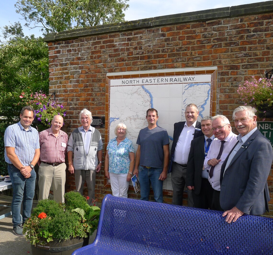 Heritage Day, group photograph of how the tile map was put up at Hunmanby station