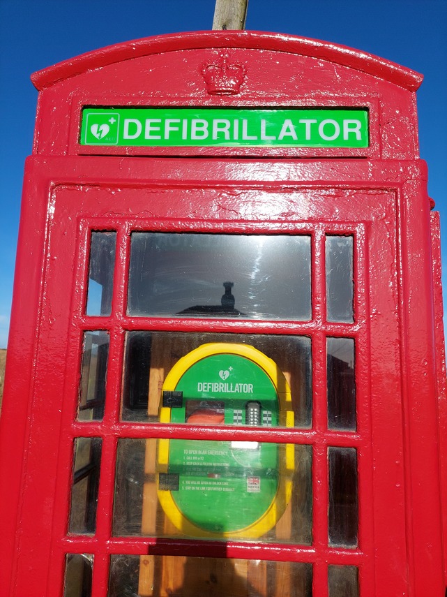 Defibrillator installed by the community in the old telephone box at Hunmanby Gap