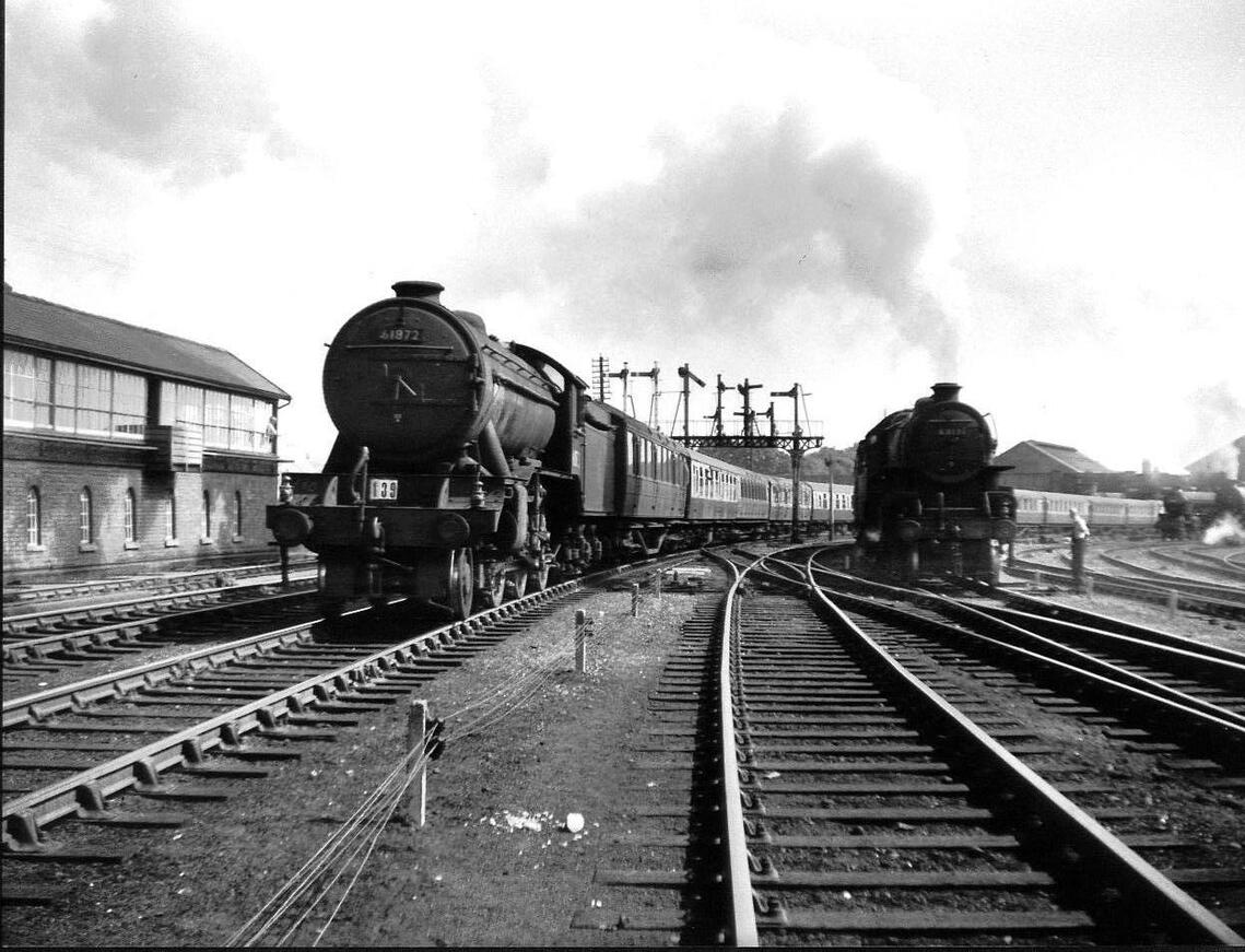 two steam hauled excursion trains heading home from the coast