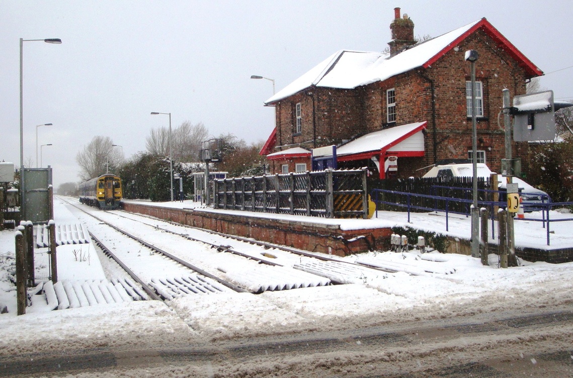 Train to Hull and beyond approaching Hunmanby in the November snow of 2017