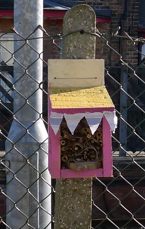 Colourful bug hotel at Hunmanby Railway Station