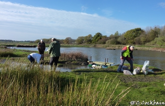Work project  at Pickering Pasture LNR mending the scrape dam