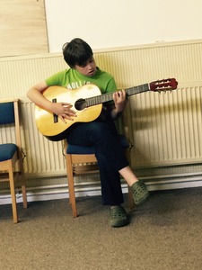 Alex on guitar
