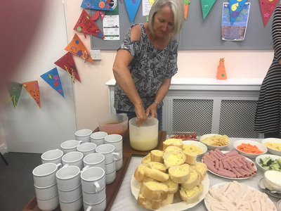 Lunch at Messy Church served by Anita