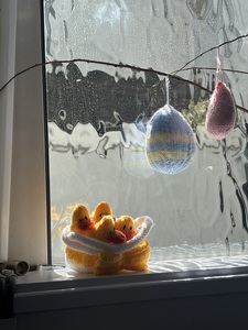 Chicks in basket knitted by Pam Powell