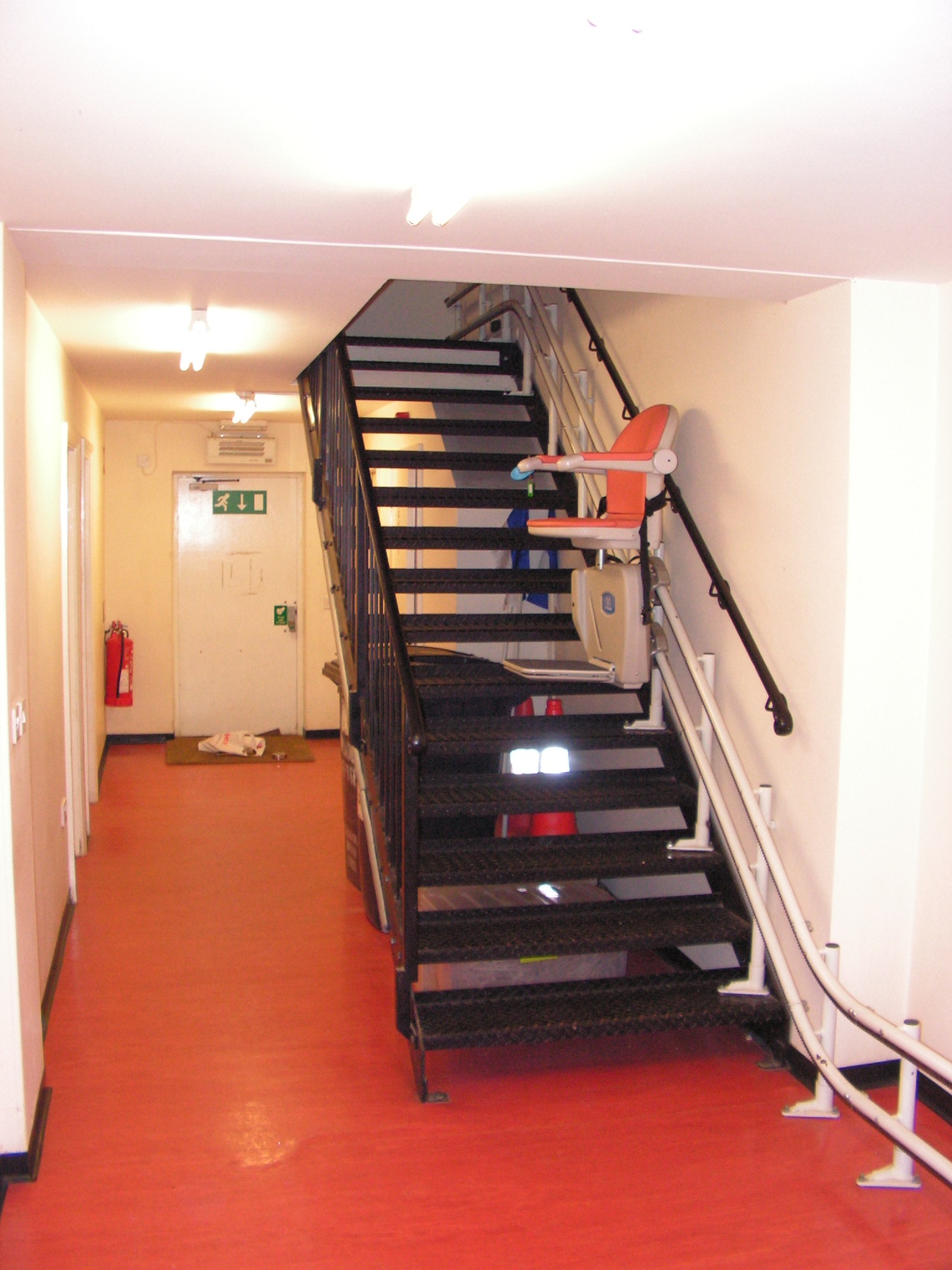 The stairs with the stair-lift half way