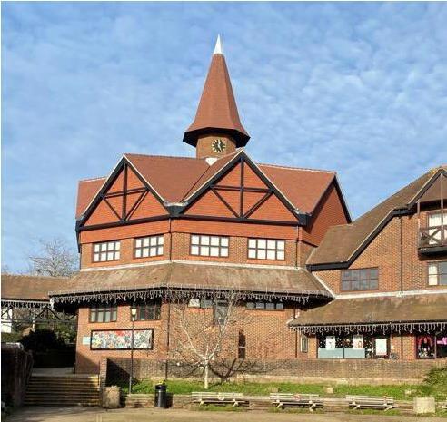 Battle Library and Clock Tower in the winter sunshine, with new roofs and swift bricks