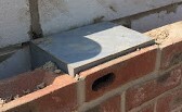 S Brick in cavity wall