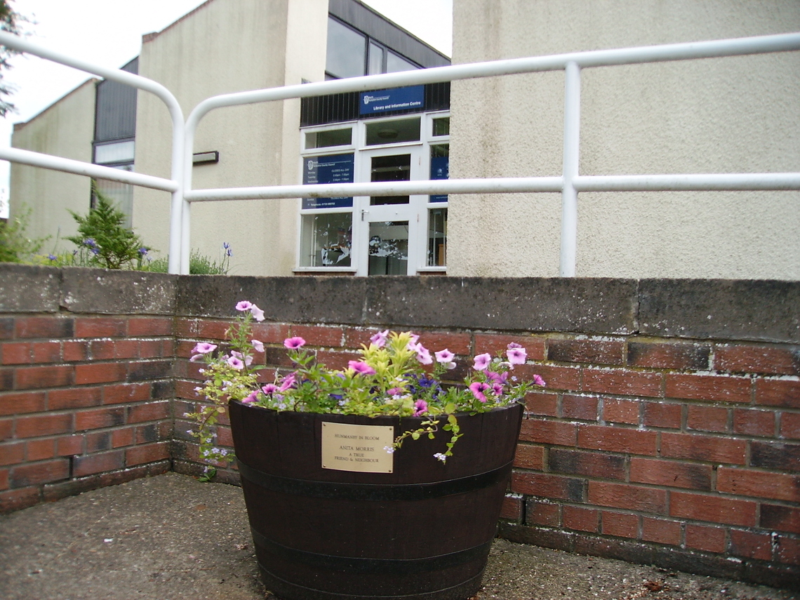 Front of the old library in 2011 showing the sponsored flower tubs