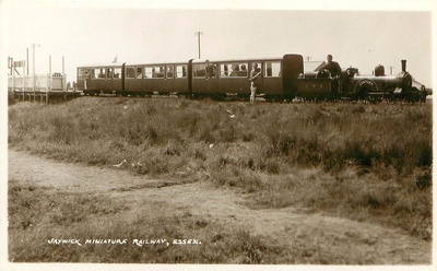 Jaywick miniature train pulled by the Century engine about to leave Jaywick Sands.