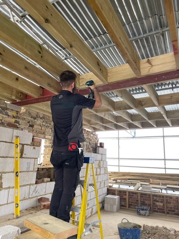 An apprentice carpenter who was made redundant and was desperately seeking another employer to continue with his carpentry apprenticeship at CONEL College