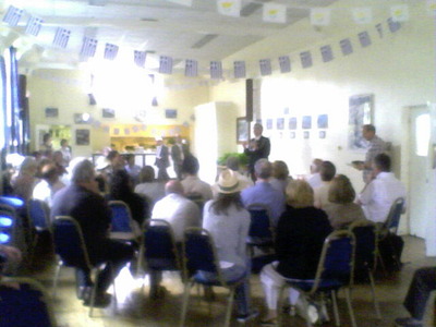 at the start of the walk, the Mayor welcomes walkers in St George's Greek Orthodox church hall