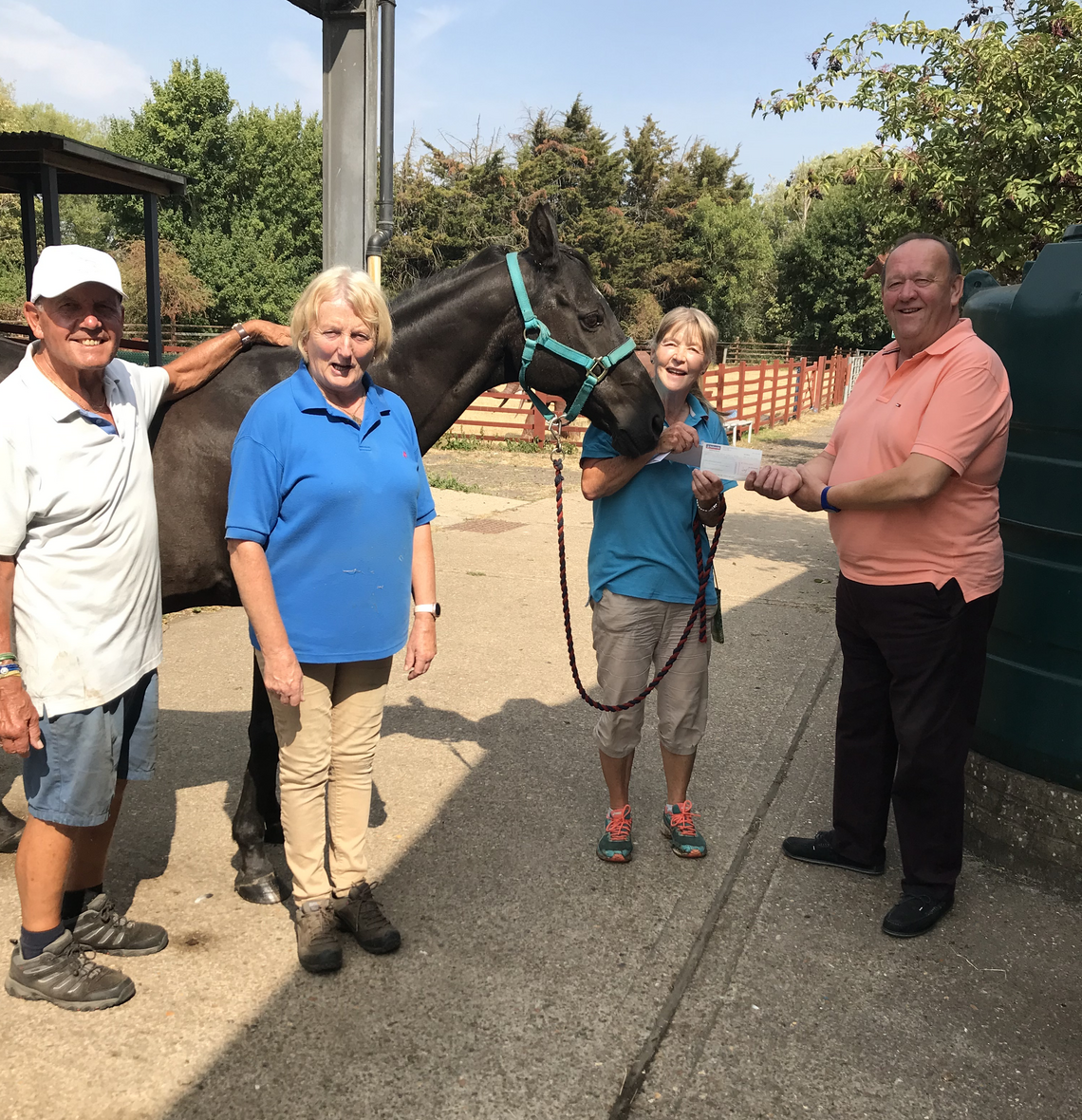 Barbara Allen pesenting cheque to Andrew Huxsted of HSNC