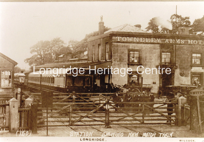 109B - Berry Lane - Railway station showing a new motor engine - 1910