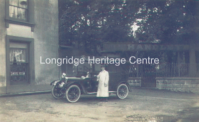 477C - Towneley Arms - View of taxi outside pub - 1920