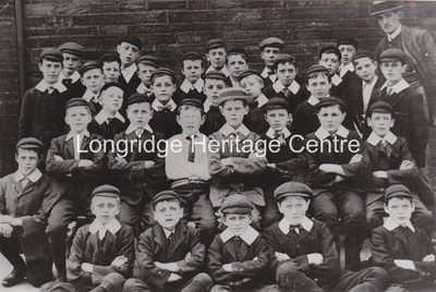 520A - Probably Council School in Chapel Street - School teacher and boys - Unknown