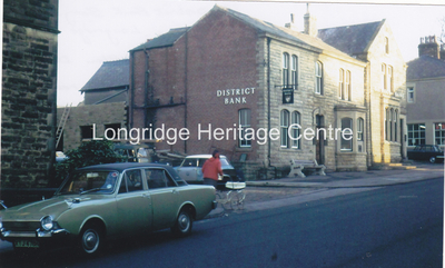546C - Berry Lane - View of District Bank - 1975