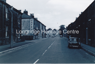 626B - Berry Lane - Looking uphill from outside Bare Dry Cleaners - 1970