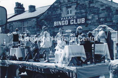 6994C - CP 67 Field Day Parade - Float passing Palace Bingo - 1970