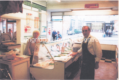 813A - Longridge Co-op - The Co-op butchers from behind the counter - 1980